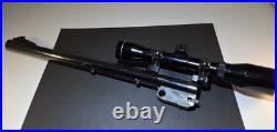 Thompson Center Arms 7mm T/CU SUPER 14 14 Barrel / 4 x 28 Scope Tasco Thompson Center Arms 7mm T/CU SUPER 14 14 Barrel / 4 x 28 Scope Tasco