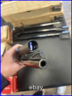 Thompson center arms 256 win with bushel phantom II scope